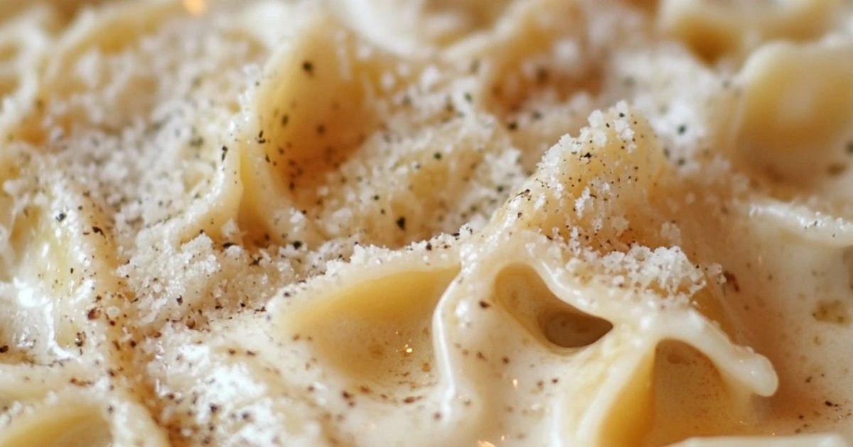 Bow tie pasta Alfredo with parmesan cheese and heavy cream